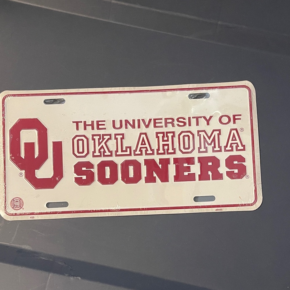 New in pkg. - University of Oklahoma Sooners License Plate (one metal plate)